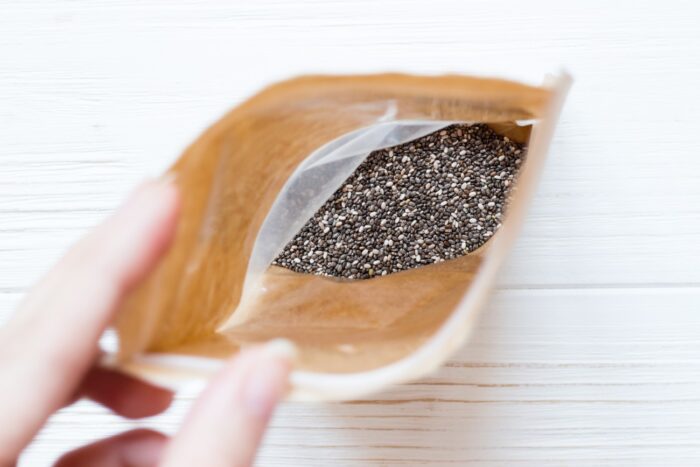 overhead view of chia seeds in brown bag